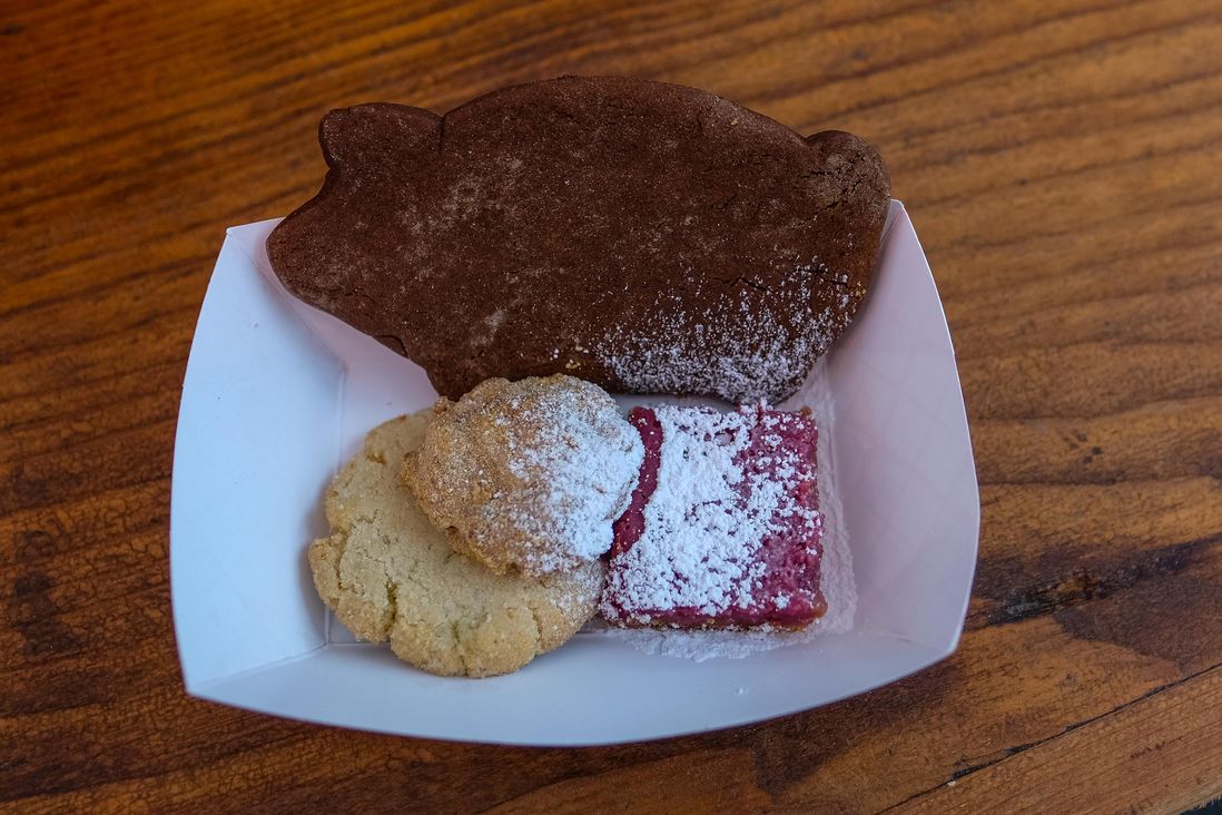 Cookie Plate featuring a Masa Snickerdoodle, a Mesquite Wedding Cookie, a Hibiscus Bar, and a Marranito ($12)